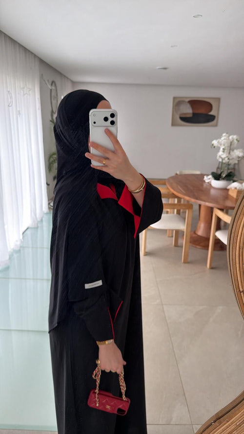 Abaya noir intérieur rouge ( matière soie de médine )
