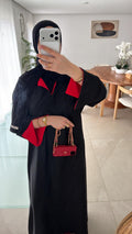 Abaya noir intérieur rouge ( matière soie de médine )